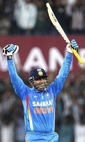 Sehwag scoring his century during his double century knock.